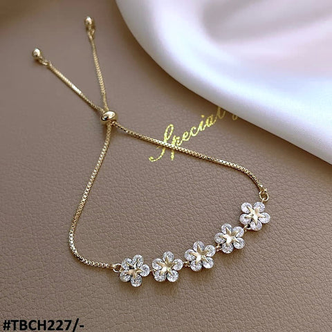 This elegant TBCH227 XST Star Flower Chain Bracelet is a must-have for any fashion-forward individual. Made with high-quality materials, this fashion jewelry piece from TJ Wholesale Pakistan will elevate any outfit and make you stand out. Adjustable for the perfect fit and adorned with star and flower accents for added charm.