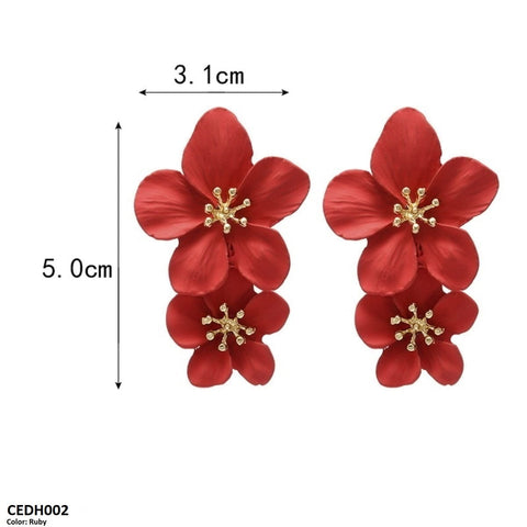 These CEDH002 JMN Flower Drop Earrings from TJ Wholesale Pakistan are more than just fashion jewelry - they are a perfect addition to your everyday wardrobe, adding a touch of elegance and style. Made with high-quality materials, these artificial earrings are the perfect fashion accessory to complete any outfit.