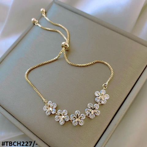 This elegant TBCH227 XST Star Flower Chain Bracelet is a must-have for any fashion-forward individual. Made with high-quality materials, this fashion jewelry piece from TJ Wholesale Pakistan will elevate any outfit and make you stand out. Adjustable for the perfect fit and adorned with star and flower accents for added charm.
