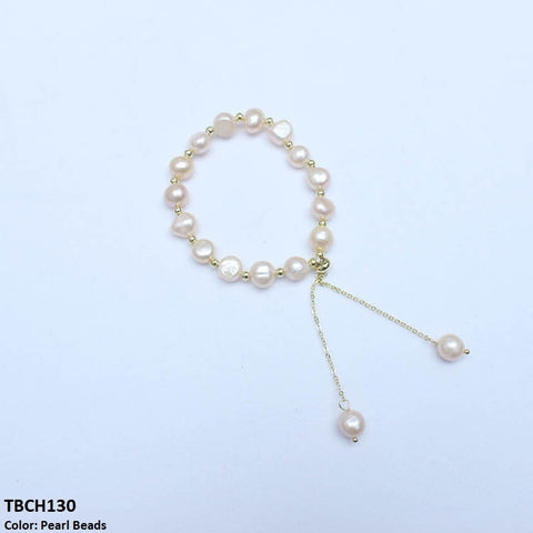 Upgrade your wardrobe with the TBCH130 ZLX Beads Bracelet from TJ Wholesale Pakistan. This stunning fashion accessory is intricately crafted with artificial beads, adding a touch of elegance to any outfit. Elevate your style and make a statement with this fashion-forward piece.
