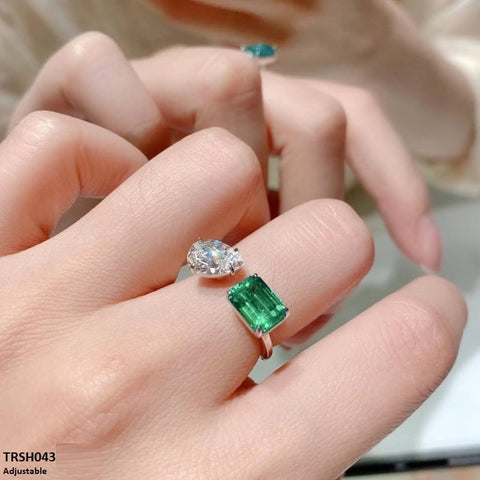 Presenting your must-have accessory: the TRSH043 KRL Pear &amp; Rectangle Adjustable Ring from TJ Wholesale Pakistan. This adjustable ring, which is made of premium materials and a fashionable appearance, can make any outfit look better. This charming accessory will give your ensemble a dash of class and style.